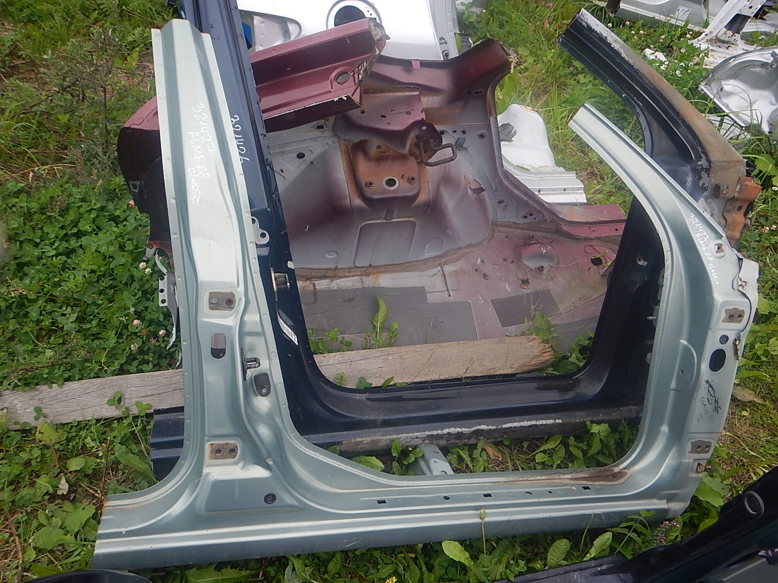 Ниссан альмера кузов n16. Детали на ниссан альмера. Детали на ниссан альмера. Боковина левая almera g15. Кузовные детали nissa almera n16.