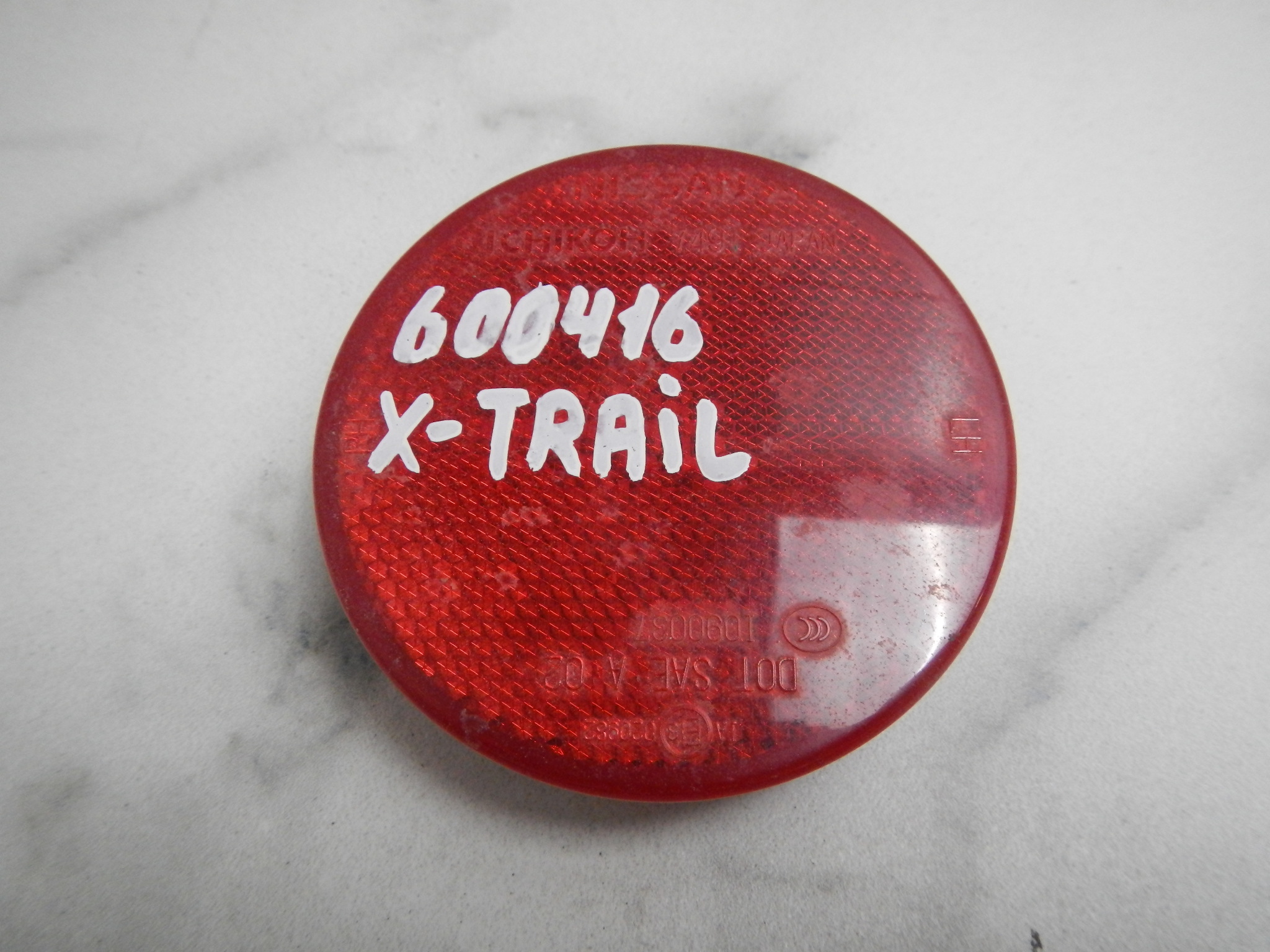 Отражатель в бампер задний левый